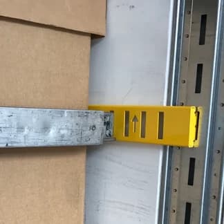 Exact-A-Track bracket positioned beside a partial load